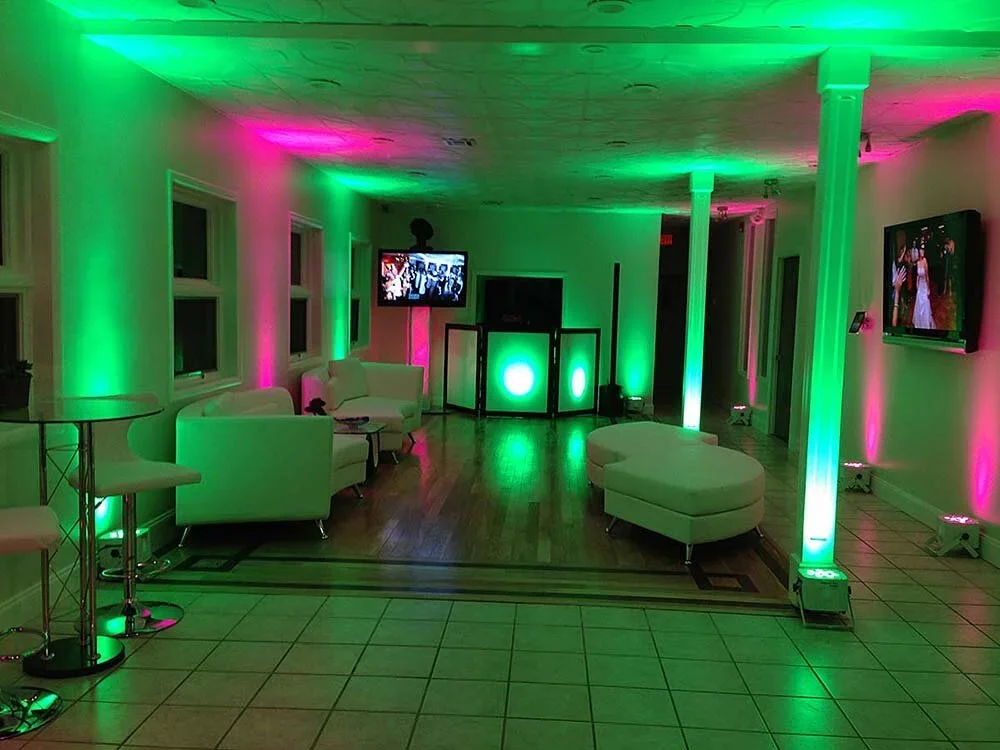 Reception room uplit in green